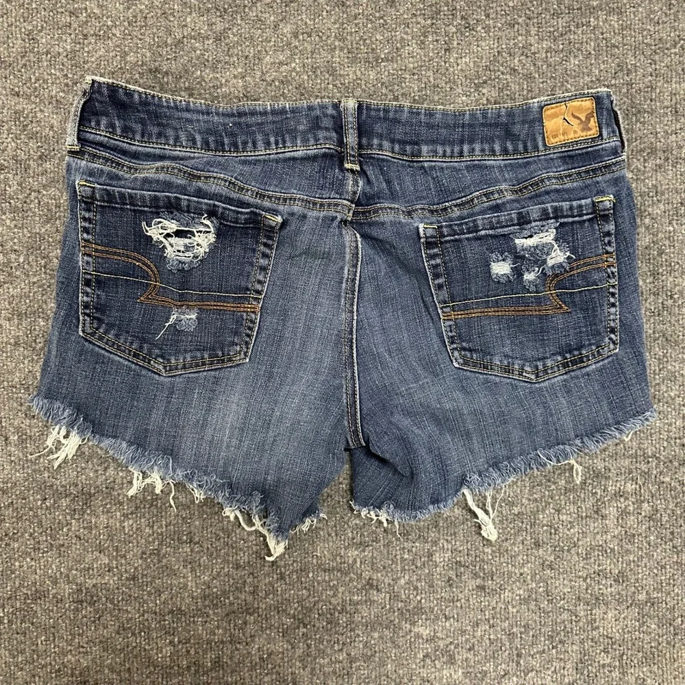 American Eagle Denim Shorts Womens Size 14 Long Dark Wash Distressed Cut Off